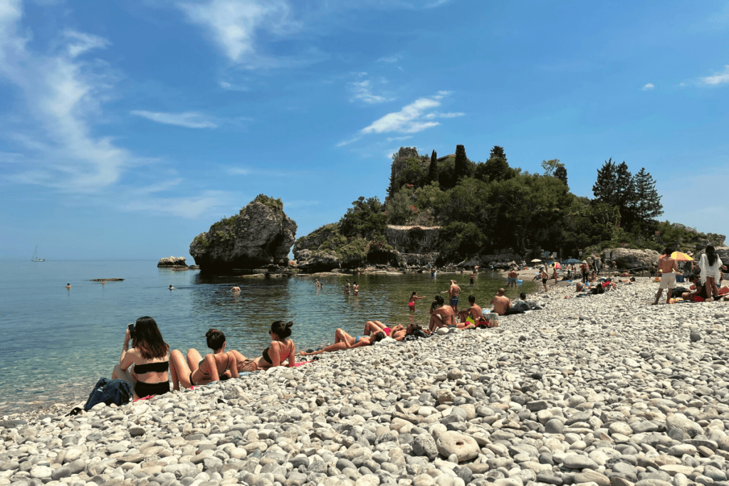 When it comes to which is better, Amalfi coast or Sicily, there are a few things to consider, including the beaches - check this one out in Taormina! 