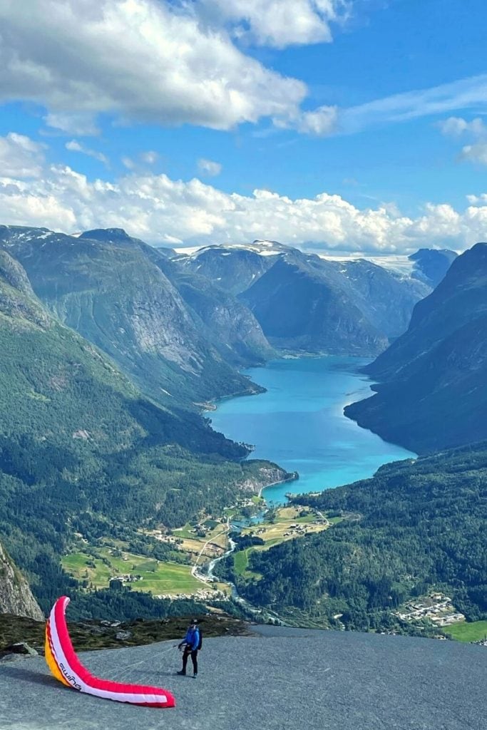 I took this from the top of the sky lift in Loen, and this guy was about to paraglide down into the fjord... no joke! Just a casual day along the road trip from bergen to alesund. 