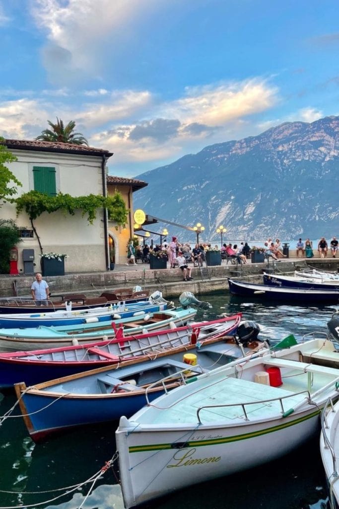 Lake Garda, and the small town of Limone, showing off a beautiful sunset. This was a highlight of our Switzerland to Italy road trip.