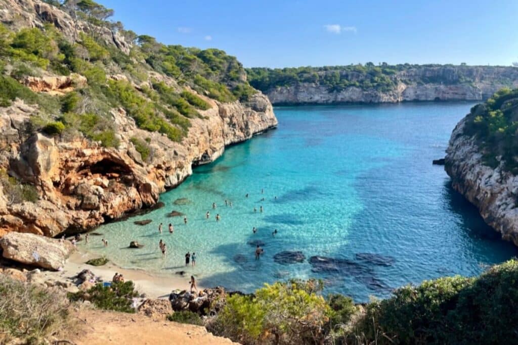 The iconic Moro Beach in Mallorca is super small, so come early.