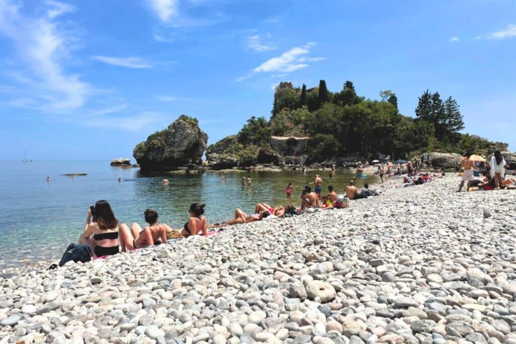 Views from the pebbly beach in at Isola Bella on the week long Sicily itinerary.