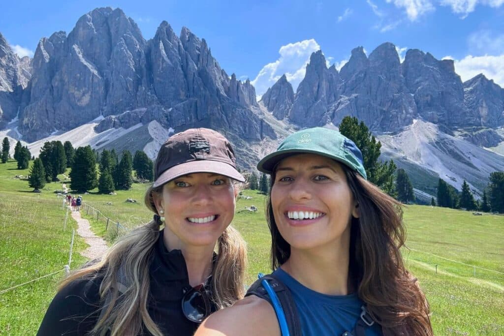 Us in Val di Funes, hiking the Adolf Munkel trail as part of our 7 Day Dolomites road trip.