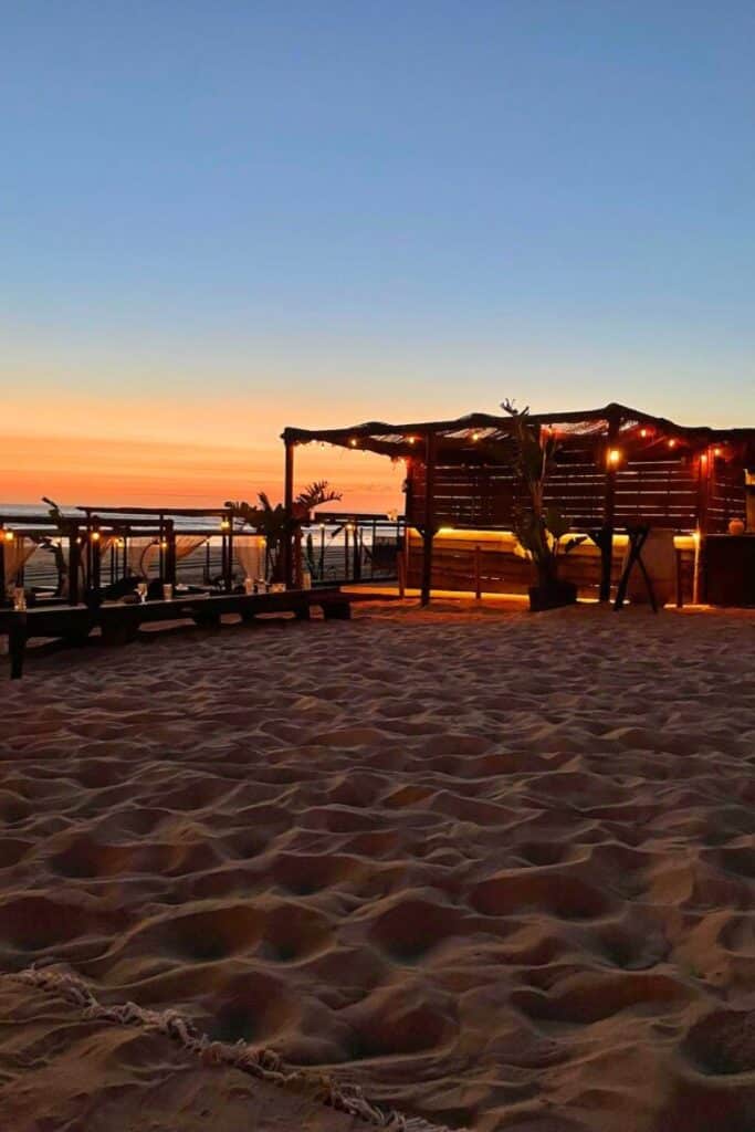 Caparica Beach near Lisbon at sunset.